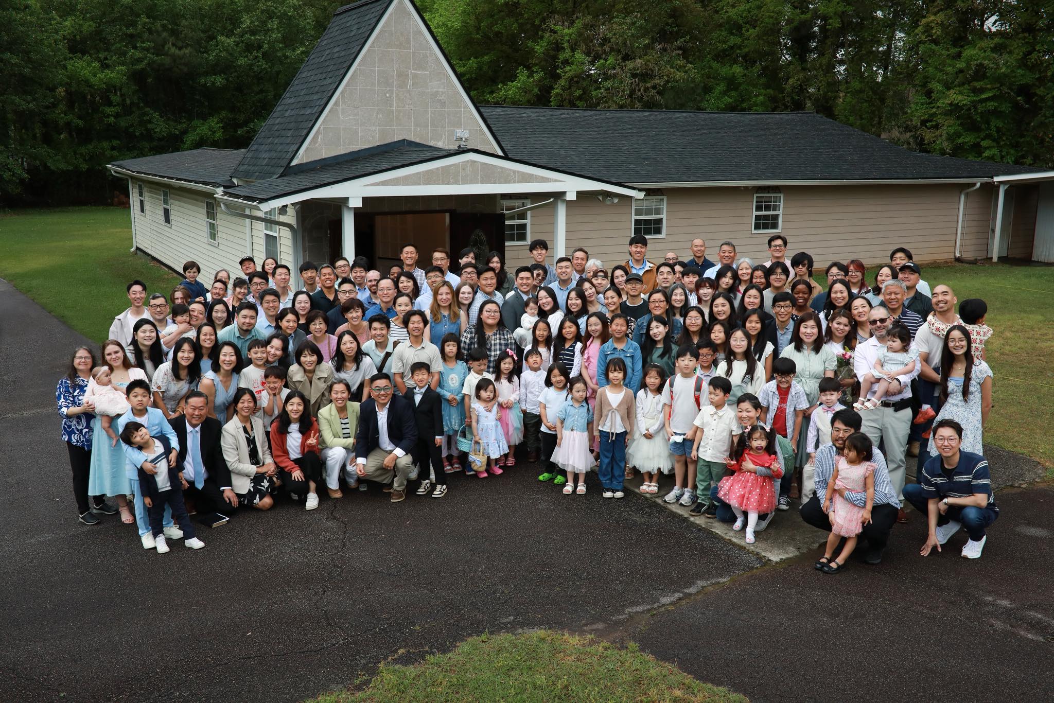 The whole church family gathered on the front steps at Easter